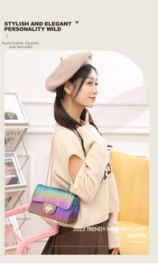Close-up of rainbow gradient woven small square bag with gold chain and twist lock