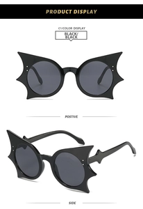 Front and side view of trendy black butterfly bat shaped oversized sunglasses