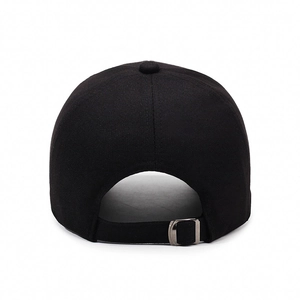 Rear view of black cotton baseball cap with adjustable silver metal buckle strap