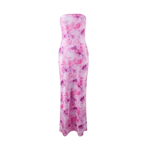 Close-up of pink and purple floral watercolor print on a slim fit strapless maxi dress