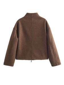 Back view of brown loose-fit cropped jacket with standing collar and detailed stitching