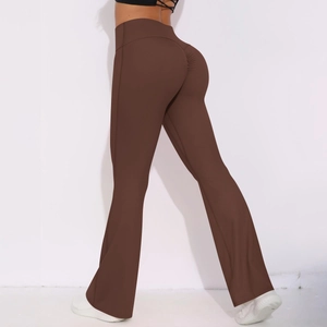 Detail view of high waisted chocolate brown yoga pants with scrunch butt and flared leg cut
