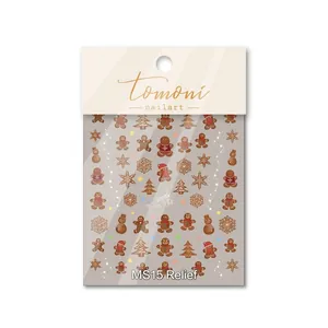 3D embossed Christmas nail stickers featuring gingerbread man, snowflakes, and festive trees