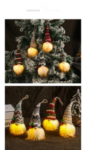 Detail of glowing Christmas gnome ornaments with knitted hats on trees and tables