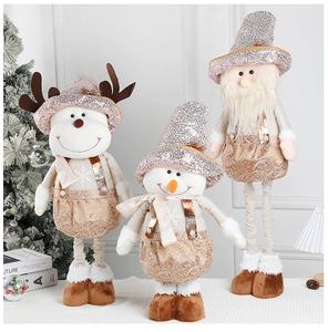 Close-up of telescopic plush reindeer and snowman dolls with sequined champagne gold fabric
