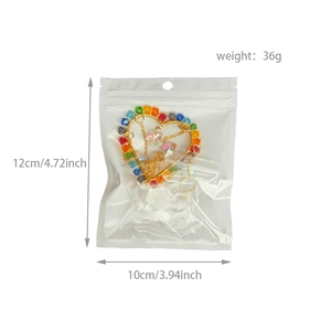 Rainbow crystal suncatcher in a 10x12cm packaging with weight and size specifications