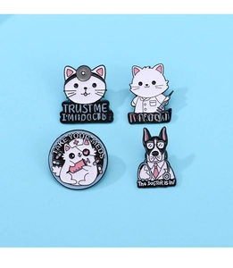 Detail of four medical cartoon enamel pins featuring cat and dog doctors on a blue surface