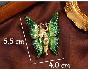 Macro shot showing dimensions of green enamel butterfly brooch with white crystals