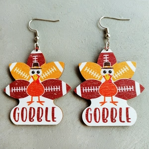 Thanksgiving turkey football earrings featuring pilgrim hat and Gobble text on wood