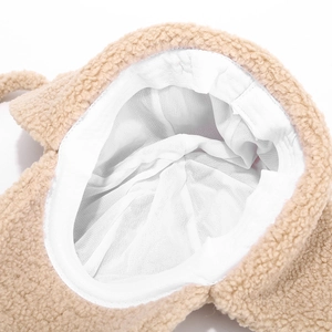 Detail view of the soft sherpa fleece exterior and breathable inner lining of the winter hat