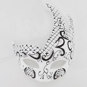 Detail of white Day of the Dead mask with black glitter patterns and sparkling rhinestones