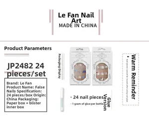Detail view of 24pcs false nail set including pink and blue tips with 1g adhesive glue