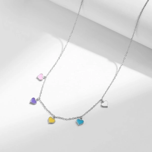 925 silver necklace featuring five colorful enamel heart pendants in a minimalist design