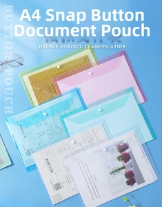 Detail of colorful A4 transparent document bags with button closure and twill texture
