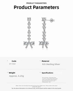 Detail view of S925 silver drop earrings with pear-cut cubic zirconia and bow accent