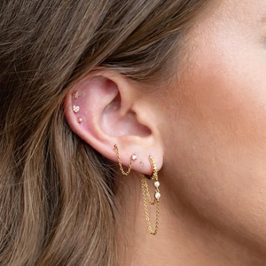 18K gold plated chain earrings with heart and star zircon studs on female ear