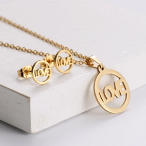 Golden titanium steel jewelry set with hollow LOVE circle pendant and stud earrings