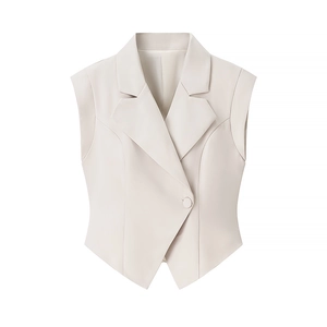 Dames beige mouwloze vestset met reverskraag en bijpassende wijde broek