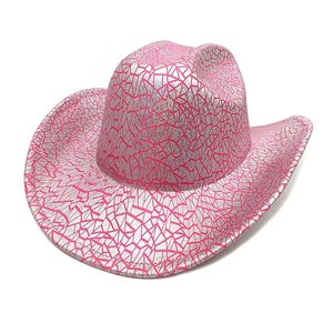 Detailed close-up of metallic pink and silver cracked texture on a western cowboy hat