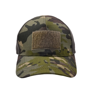 Macro view of ripstop camouflage fabric and Velcro patch on the tactical baseball cap