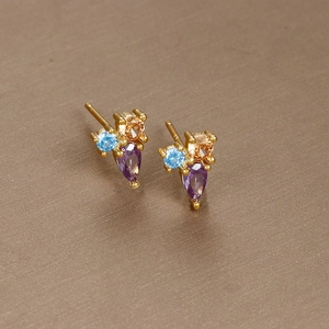 Exquisite gold butterfly earrings featuring purple teardrop and blue zircon gemstones
