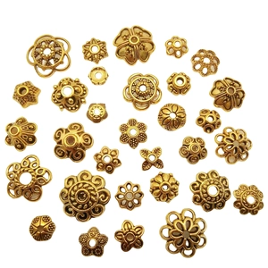 Perles d'espacement en métal doré en forme de fleur pour la création de bijoux