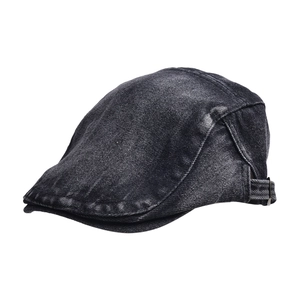 Detail view of washed denim ivy cap featuring adjustable metal buckle and vintage texture