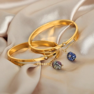 Vintage gold-plated titanium steel bracelet set with natural stone and zircon pendants