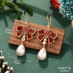 French red enamel bow earrings with white pearl drops and crystals in festive setting
