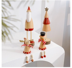 Close-up of wooden Christmas ornaments featuring Santa, snowman, and reindeer figures