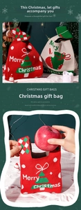 Close-up of knitted Christmas gift bags with Merry Christmas text and festive patterns