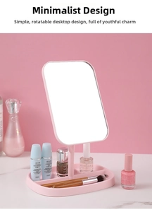 Pink desktop makeup mirror with storage base tray for cosmetics and rotating function