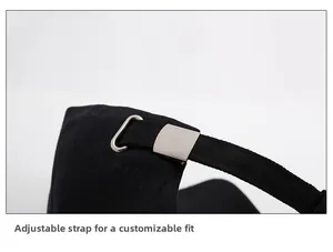 Detail of black cotton baseball cap showing the adjustable silver metal buckle at the back