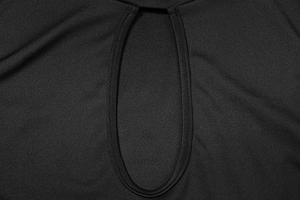 Detail view of the elegant black dress featuring a stylish keyhole cutout and fine knit texture