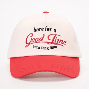 Close-up of Good Time embroidery on a red and off-white five-panel baseball cap