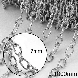 Detailed macro view of 7mm silver stainless steel twisted oval link chain jewelry
