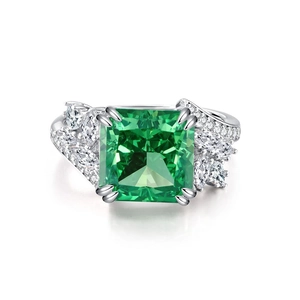Elegant S925 sterling silver ring featuring a radiant green emerald-cut center stone