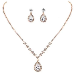 Detailed close-up of rose gold zircon necklace and teardrop earrings jewelry set