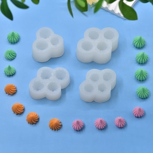 Spiral cream shape silicone baking mold set for fondant on a light blue background
