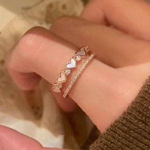Elegant rose gold double-layer open ring featuring zircon hearts and mother-of-pearl