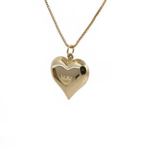 Minimalist golden heart pendant necklace with a matching box chain on white background