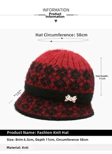 Detail of red and black knit hat showing dimensions and golden butterfly brooch detail