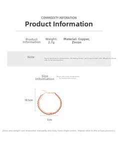 Detailed view of 18k gold plated double-layer bracelet with zircon and red beads