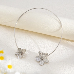 Silver metallic open choker necklace featuring minimalist 3D textured flower accents