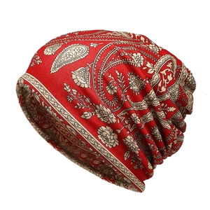 Red paisley patterned knit beanie hat for men and women with slouchy vintage style