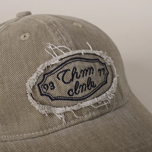 Vintage khaki cotton baseball cap with embroidered patch in American street style