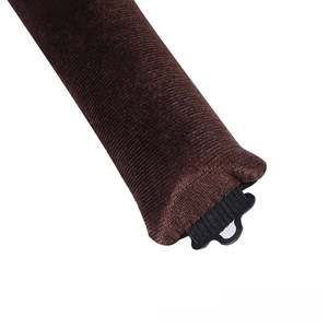 Detail of brown velvet heatless hair curler featuring black plastic hook and fine stitching
