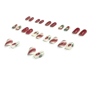Christmas press-on nails set with Santa Claus and red candy stripe festive patterns