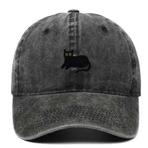 Close-up of black cat embroidery on a dark grey washed denim baseball cap