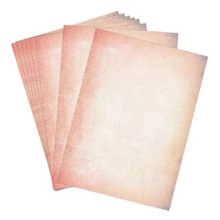 Macro detail of fan-shaped vintage scrapbooking paper with aged parchment texture